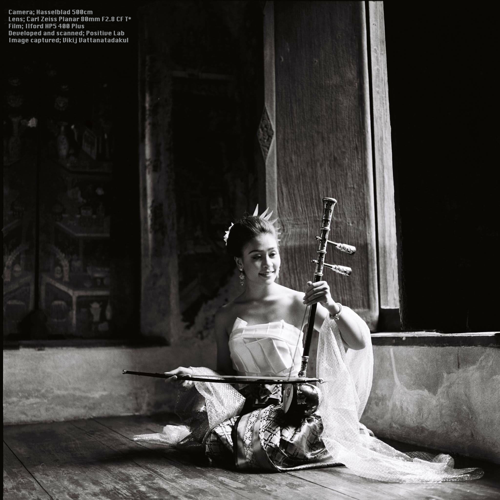 Thai girl and her music string